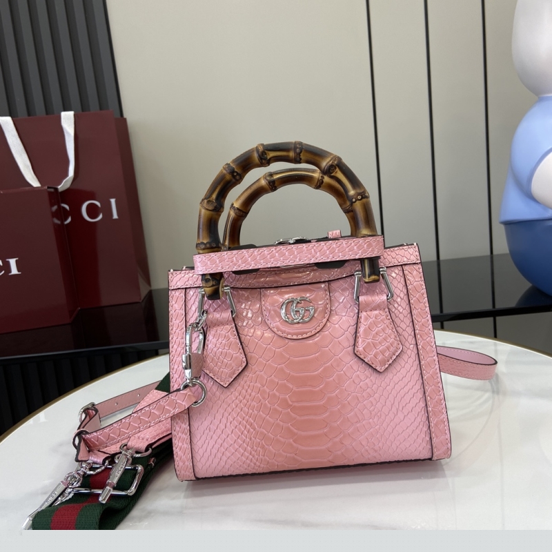 G*u*i top handle bags